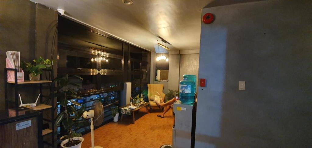 TV a/nebo společenská místnost v ubytování AJ Tourist Inn