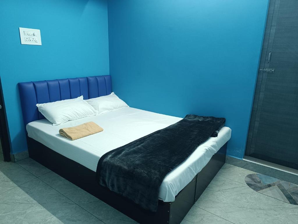 Postel nebo postele na pokoji v ubytování SK villa Homestay