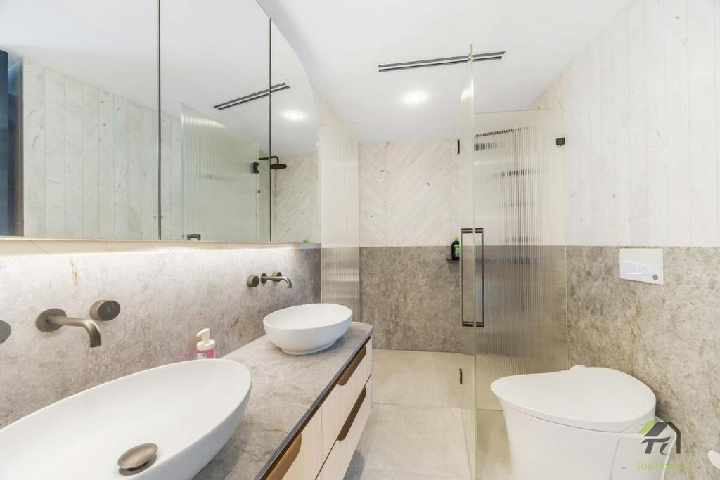 a bathroom with a sink and a toilet and a shower at Harbour view new year firework in Sydney