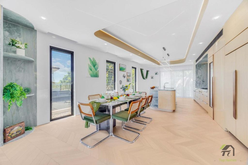 a dining room with a table and chairs at Harbour view new year firework in Sydney