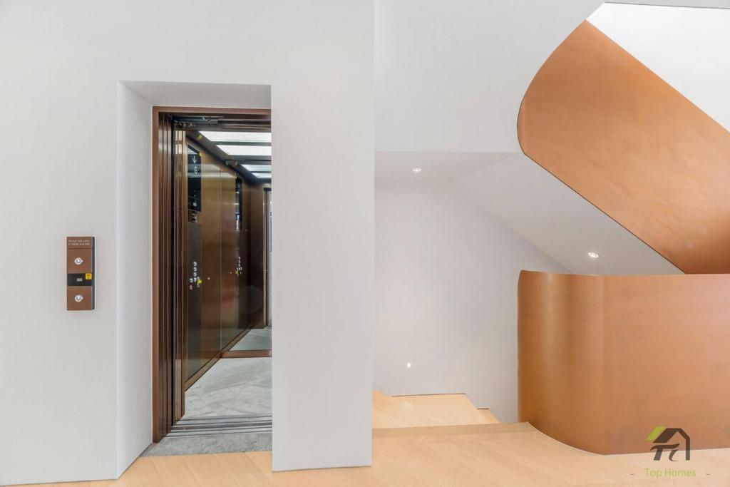 a room with a staircase with a wooden floor at Harbour view new year firework in Sydney