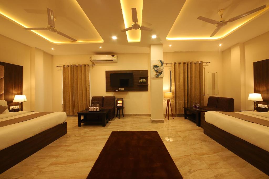 Postel nebo postele na pokoji v ubytování Perfectstayz Dhruv Nanda near Haridwar Railway Station