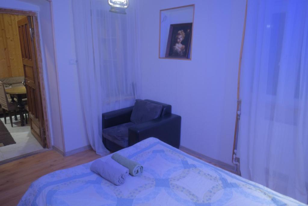 Postel nebo postele na pokoji v ubytování Loreta
