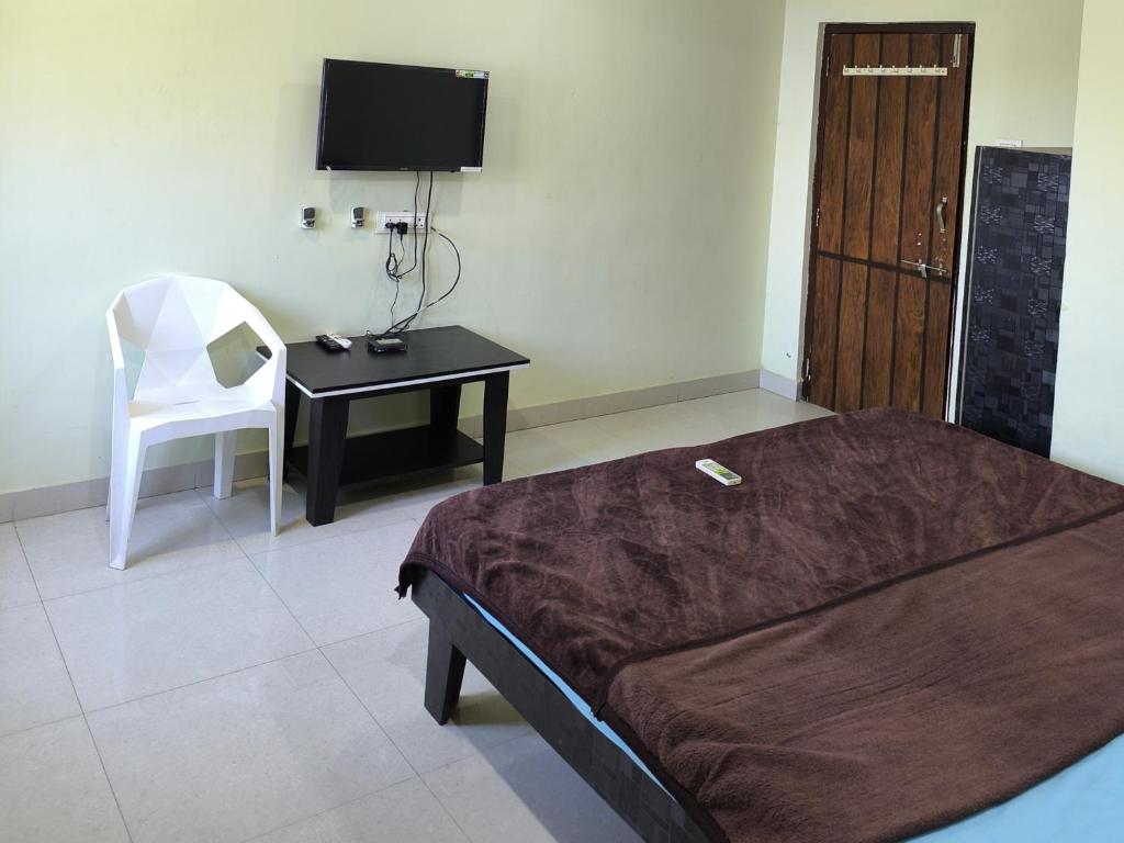 Μια τηλεόραση ή/και κέντρο ψυχαγωγίας στο Royal Residency Luxury Lodge