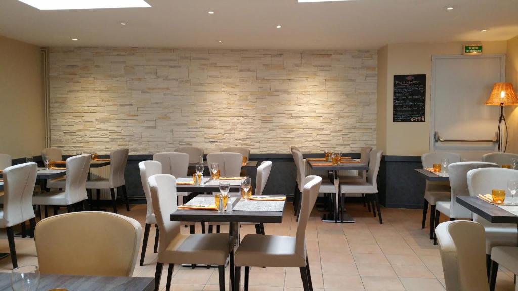 Posezení v ubytování Hôtel Restaurant Le Mulberry Arromanches