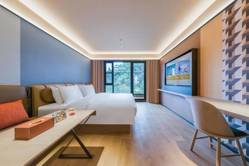 Μια τηλεόραση ή/και κέντρο ψυχαγωγίας στο Orange Hotel Guilin Yangshuo West Street Branch