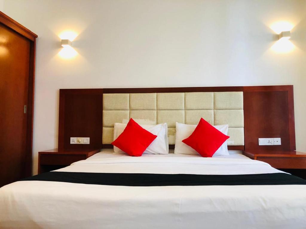 Postel nebo postele na pokoji v ubytování Capital Wind Beach Cabanas