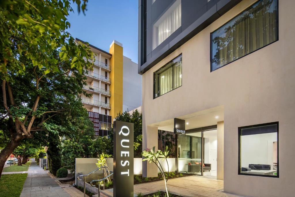 a building with a hotel sign in front of it at Quest Kings Park in Perth