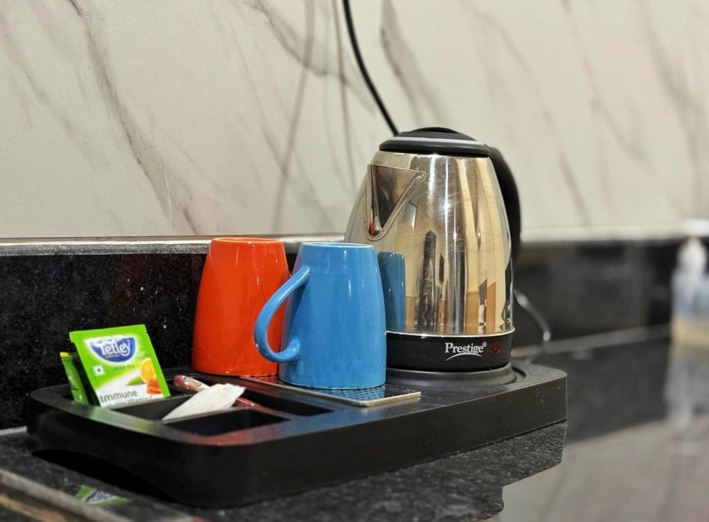 Příslušenství pro přípravu čaje a kávy v ubytování Himalayan Suite