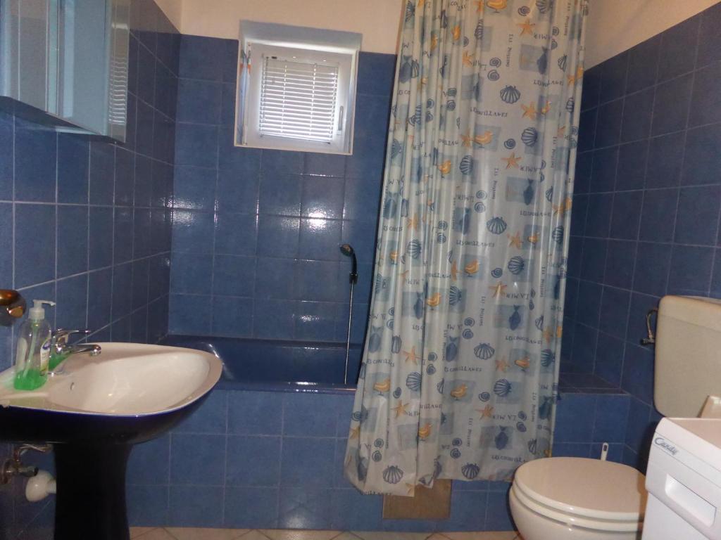 Koupelna v ubytování Apartments Adria