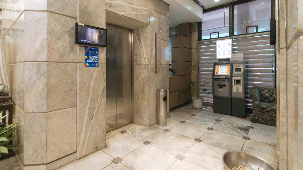 Koupelna v ubytování Sunette Tower Makati