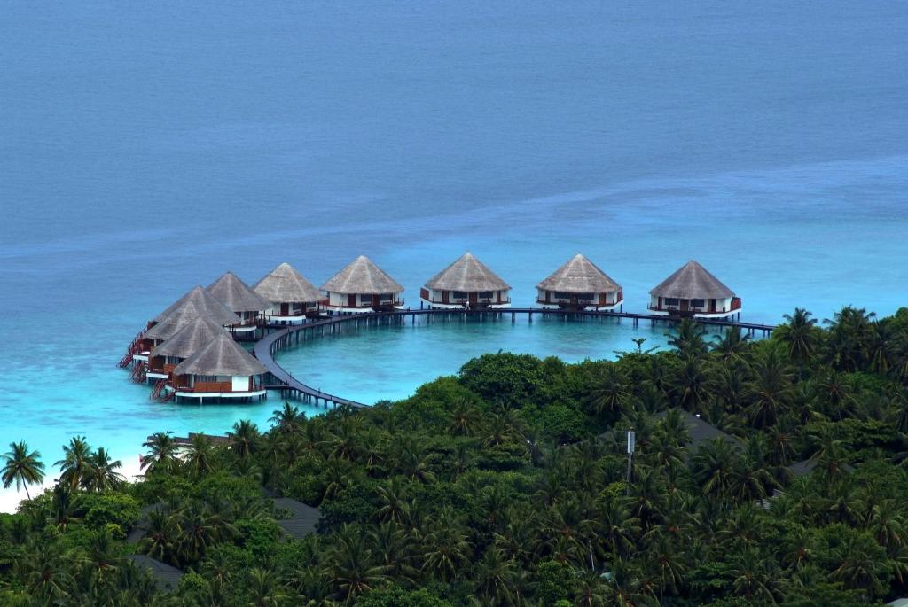 a group of overwater bungalows in the ocean at Adaaran Prestige Water Villas - with Dine around Premium All inclusive - 24 hours in Raa Atoll