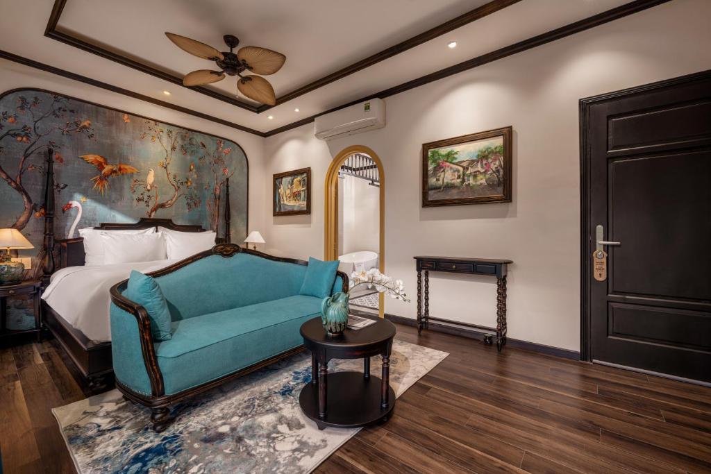 Giường trong phòng chung tại The An Bang Vanessa - Indochine Boutique Hotel
