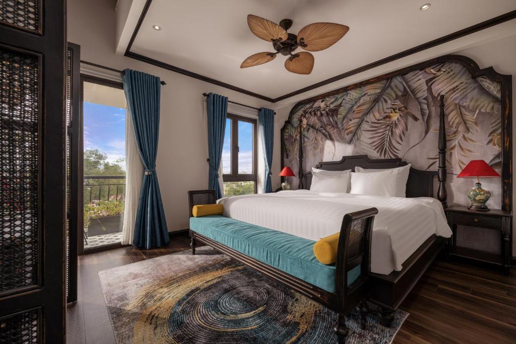 Giường trong phòng chung tại The An Bang Vanessa - Indochine Boutique Hotel