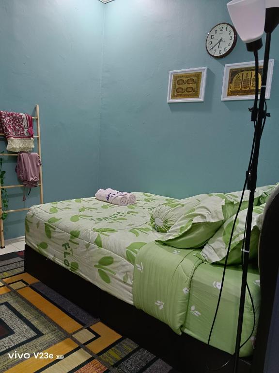Postel nebo postele na pokoji v ubytování HANS HOMESTAY