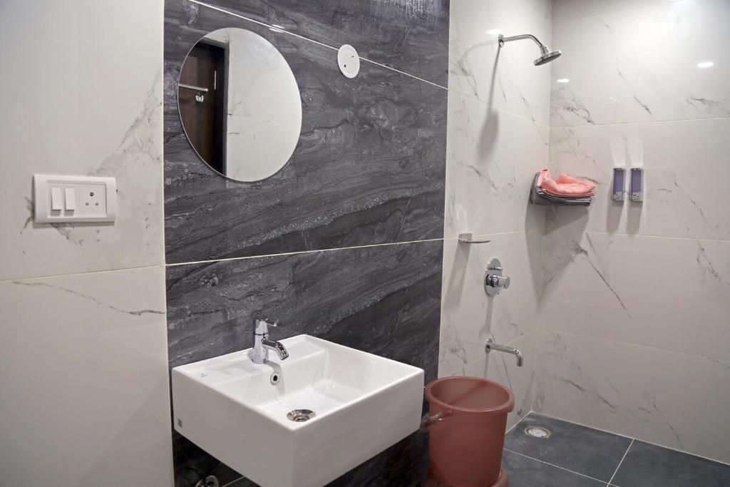 Koupelna v ubytování Amara Bari - 3BHK, Gachibowli, Hyderabad