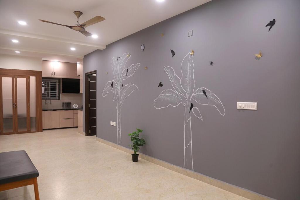 Kuchyň nebo kuchyňský kout v ubytování Amara Bari - 3BHK, Gachibowli, Hyderabad