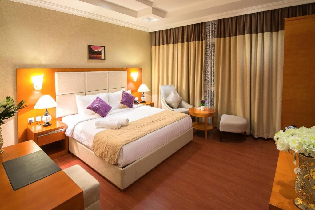 Postel nebo postele na pokoji v ubytování Hotel Ramida Plaza At Delhi Airport