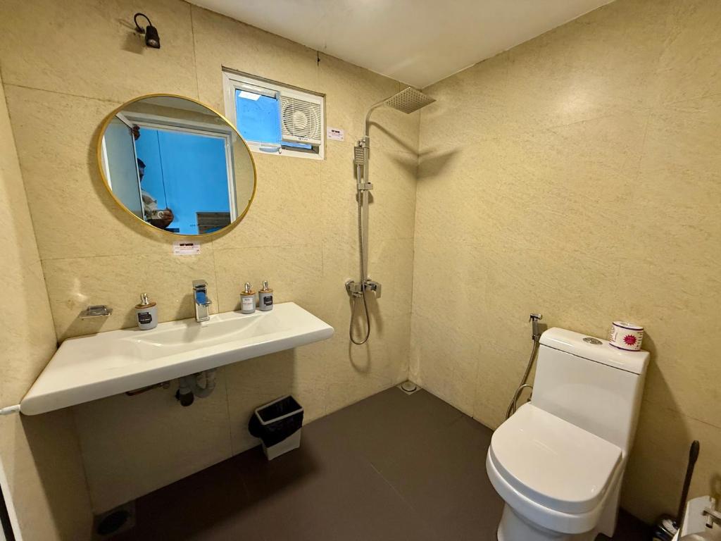 Koupelna v ubytování Ella Inn Hotel
