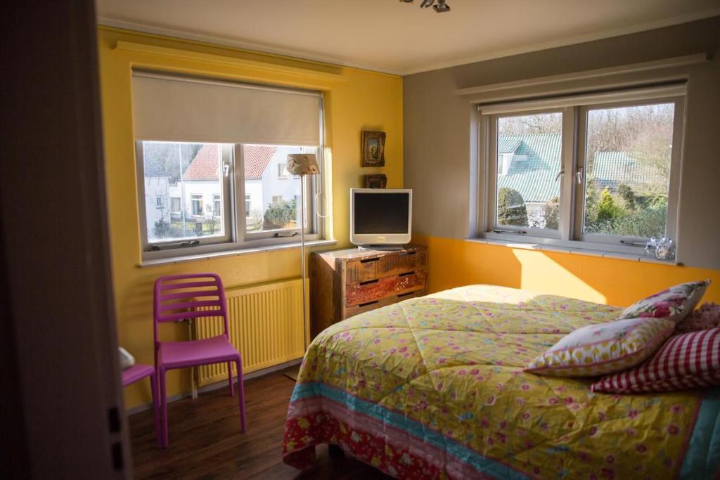 Postel nebo postele na pokoji v ubytování Hotel Domburg4you
