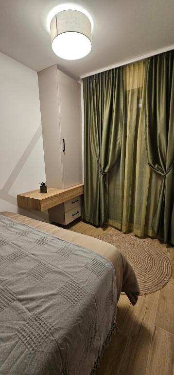 Una cama o camas en una habitación de Valena 1 Divčibare