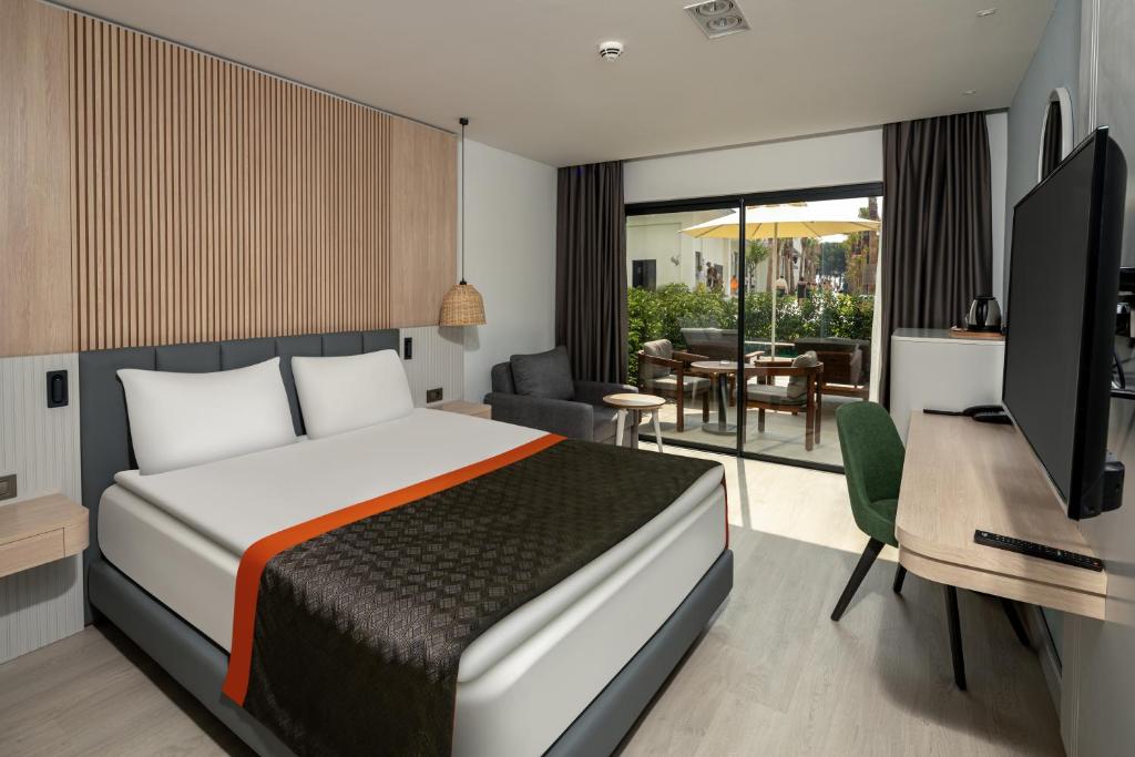 Postel nebo postele na pokoji v ubytování Swandor Hotels & Resorts - Kemer
