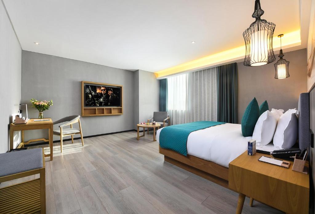 Posezení v ubytování Mehood Lestie International Hotel Nancun Wanbo Metro Station Branch - Free Shuttle Bus to Canton Fair Complex During Canton Fair Period & Free breakfast & Free afternoon tea & Free midnight snack & Free VPN Internet Access