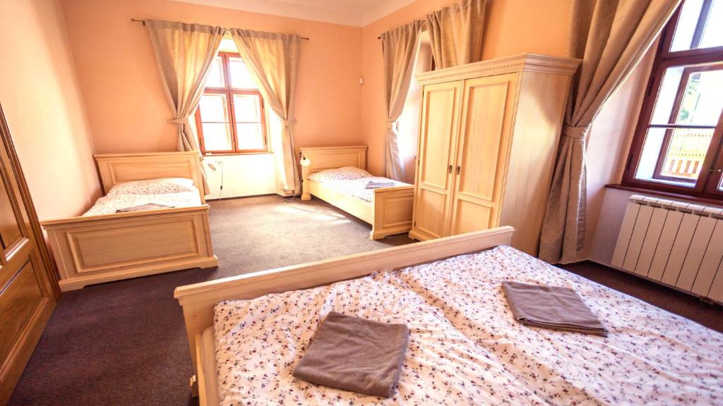 Postel nebo postele na pokoji v ubytování Penzion Johannes, Rýmařov - Stará Ves