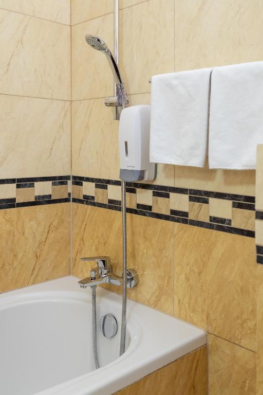 Koupelna v ubytování Hotel Orbita