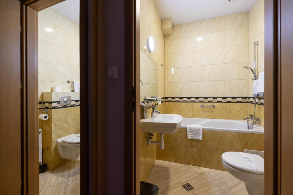 Koupelna v ubytování Hotel Orbita