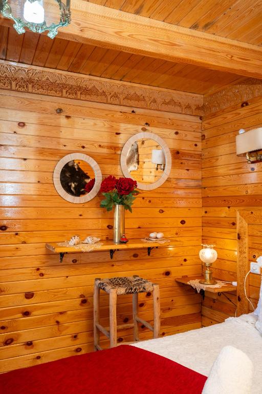 A bed or beds in a room at Dar AL GHAZAL