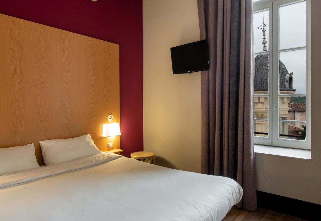 Postel nebo postele na pokoji v ubytování B&B HOTEL Castres Centre Gambetta
