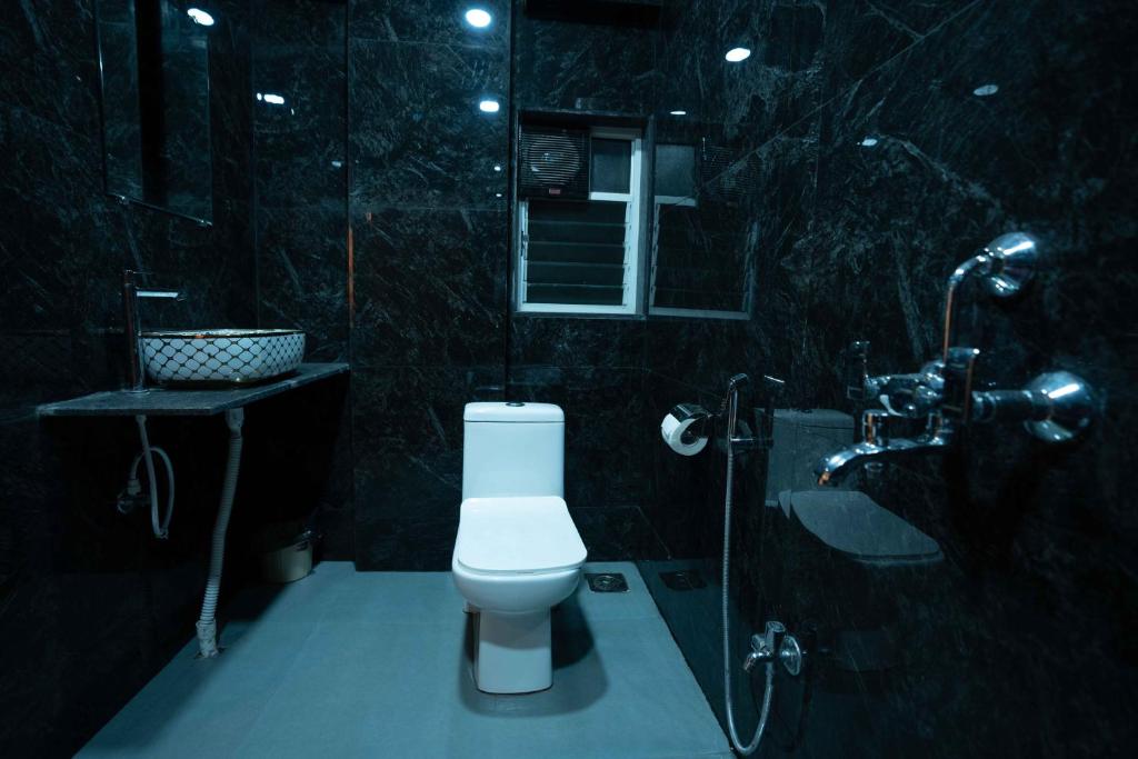 Koupelna v ubytování Majestic Inn