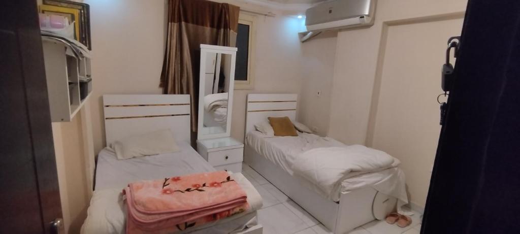 Postel nebo postele na pokoji v ubytování Room in Appartment