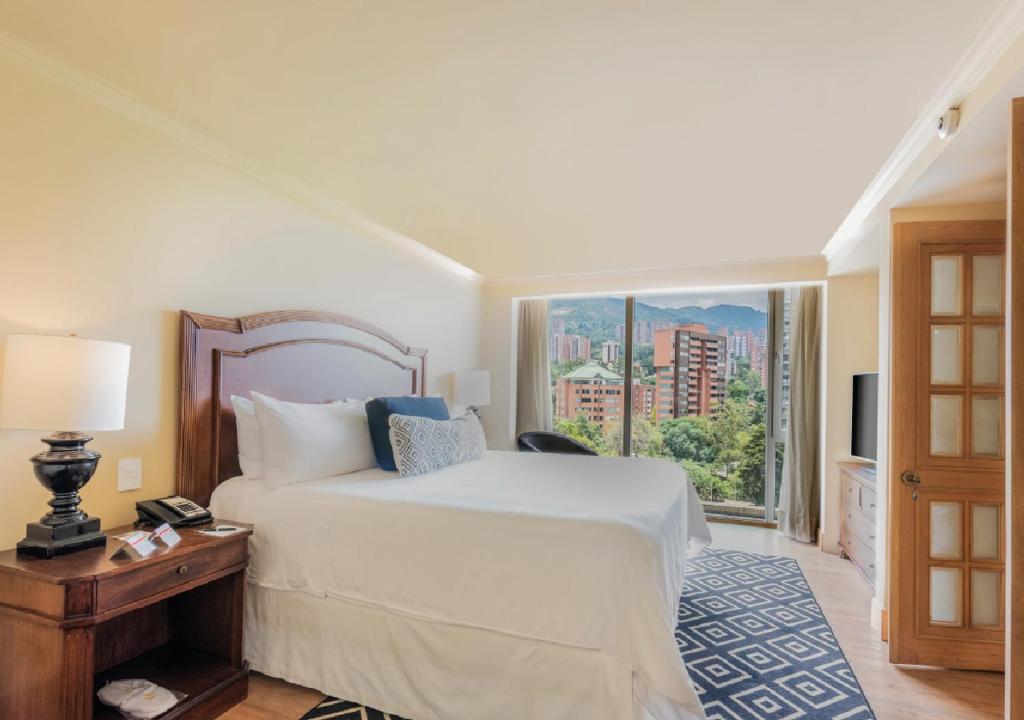 Postel nebo postele na pokoji v ubytování InterContinental Medellin - Movich by IHG