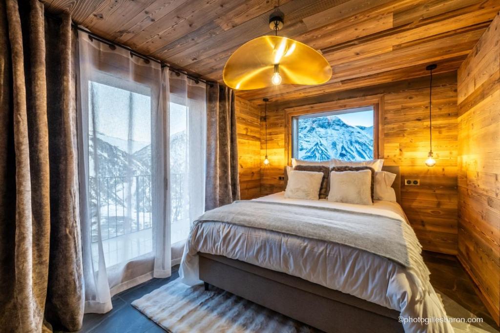 Ένα ή περισσότερα κρεβάτια σε δωμάτιο στο Le 1850 Lodge