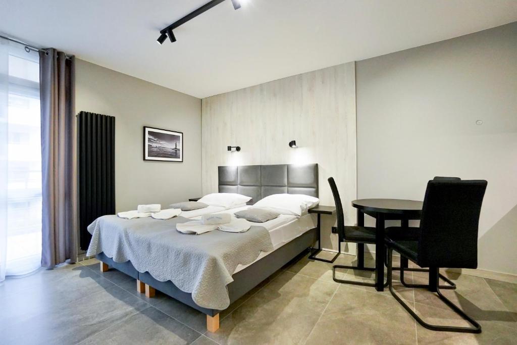 Posteľ alebo postele v izbe v ubytovaní Villa Mistral by Baltic Home