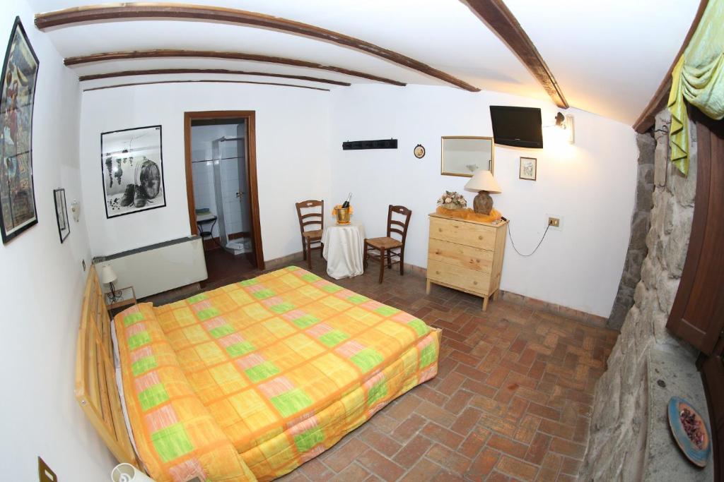 Posteľ alebo postele v izbe v ubytovaní Agriturismo Monte Due Torri