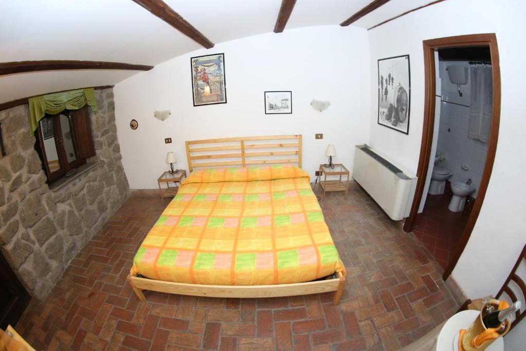 Posteľ alebo postele v izbe v ubytovaní Agriturismo Monte Due Torri