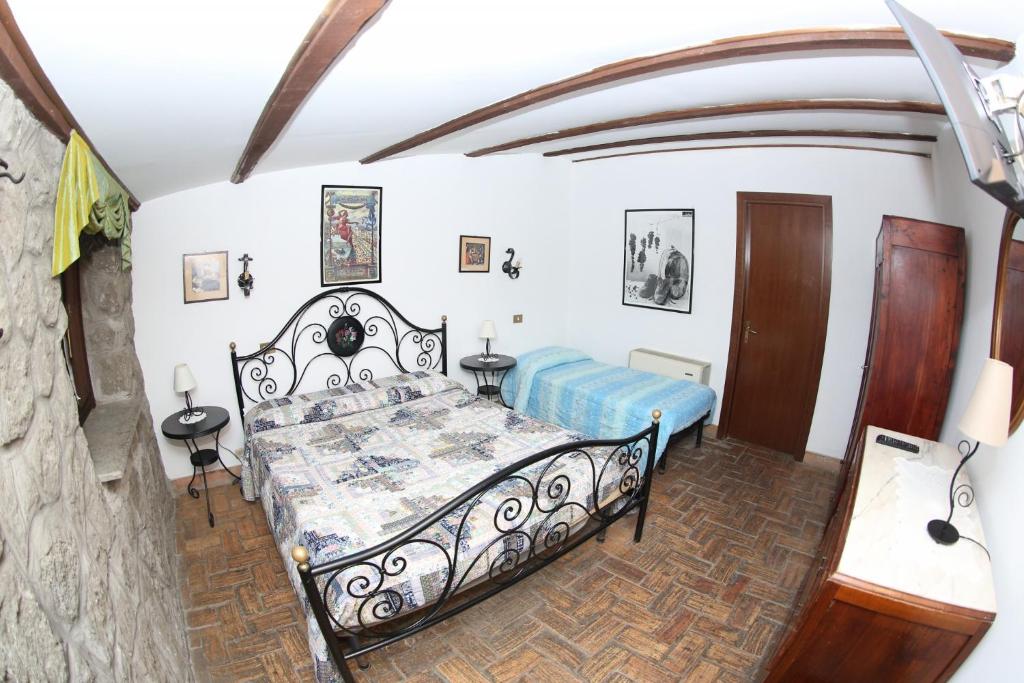 Posteľ alebo postele v izbe v ubytovaní Agriturismo Monte Due Torri