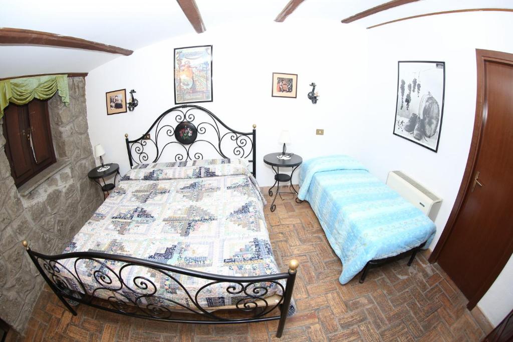 Posteľ alebo postele v izbe v ubytovaní Agriturismo Monte Due Torri