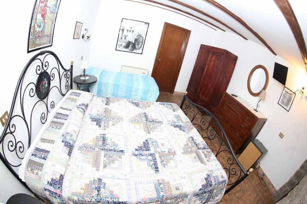 Posteľ alebo postele v izbe v ubytovaní Agriturismo Monte Due Torri