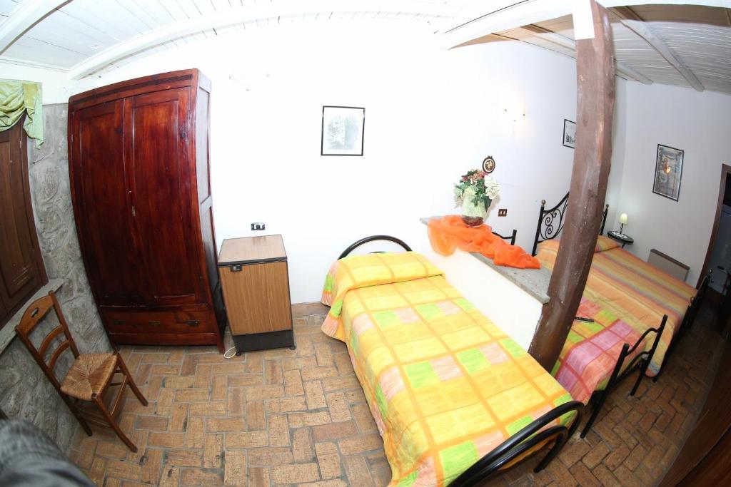 Posteľ alebo postele v izbe v ubytovaní Agriturismo Monte Due Torri