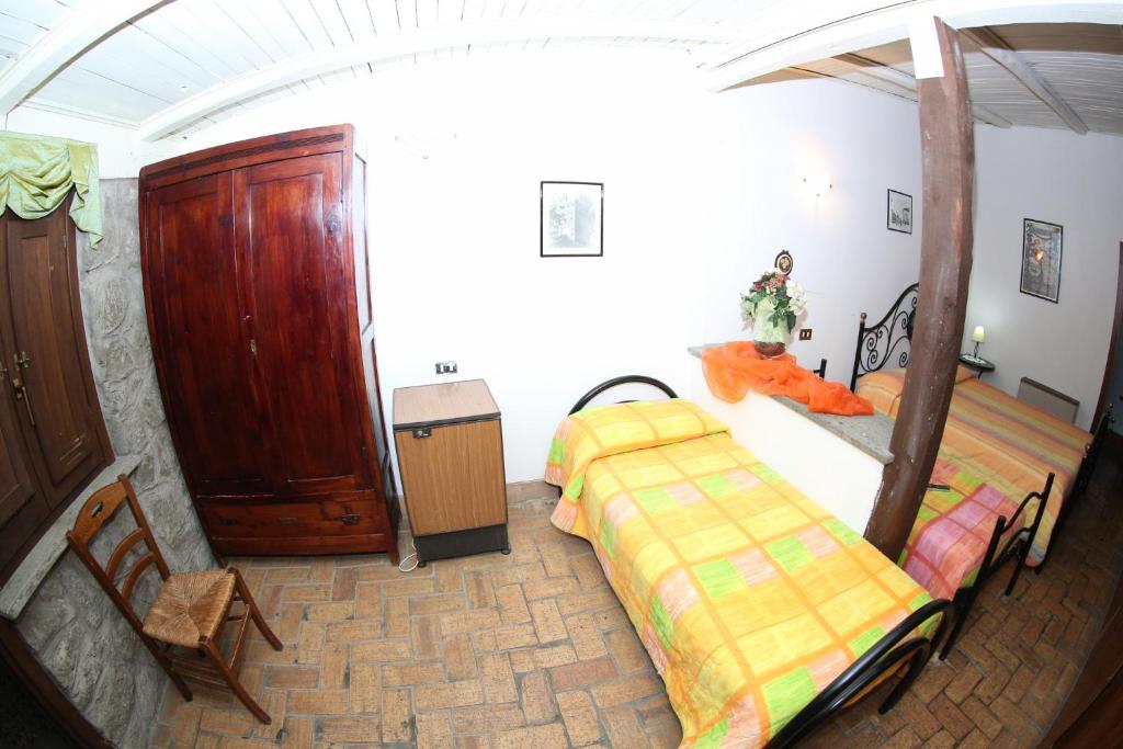 Posteľ alebo postele v izbe v ubytovaní Agriturismo Monte Due Torri