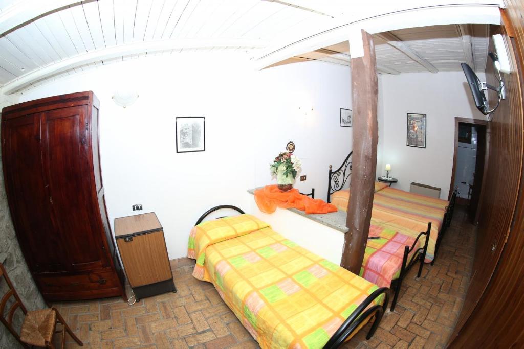 Posteľ alebo postele v izbe v ubytovaní Agriturismo Monte Due Torri