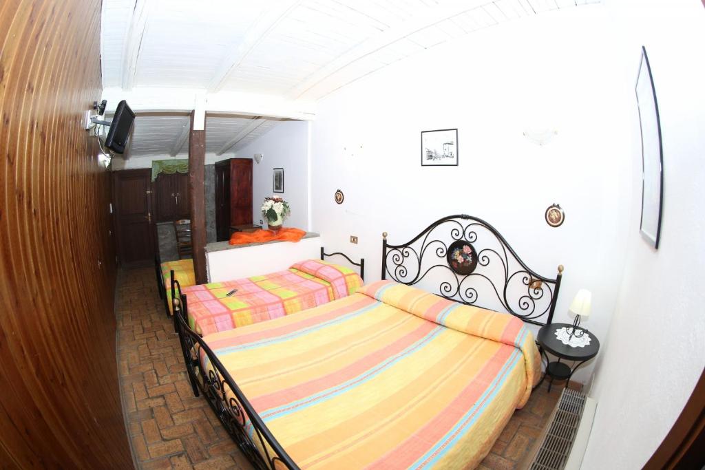 Posteľ alebo postele v izbe v ubytovaní Agriturismo Monte Due Torri