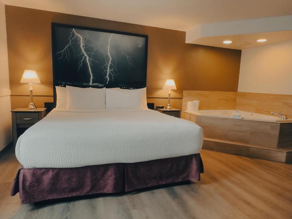 Postel nebo postele na pokoji v ubytování Super 8 by Wyndham Dawson Creek