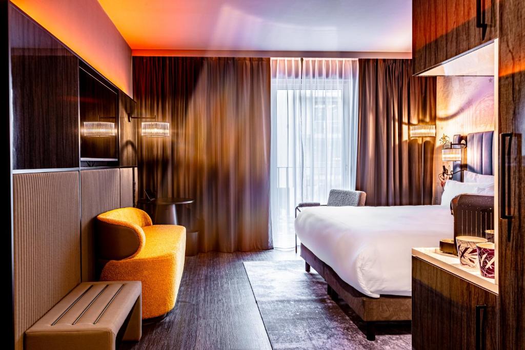 Postel nebo postele na pokoji v ubytování NYX Hotel Hamburg by Leonardo Hotels