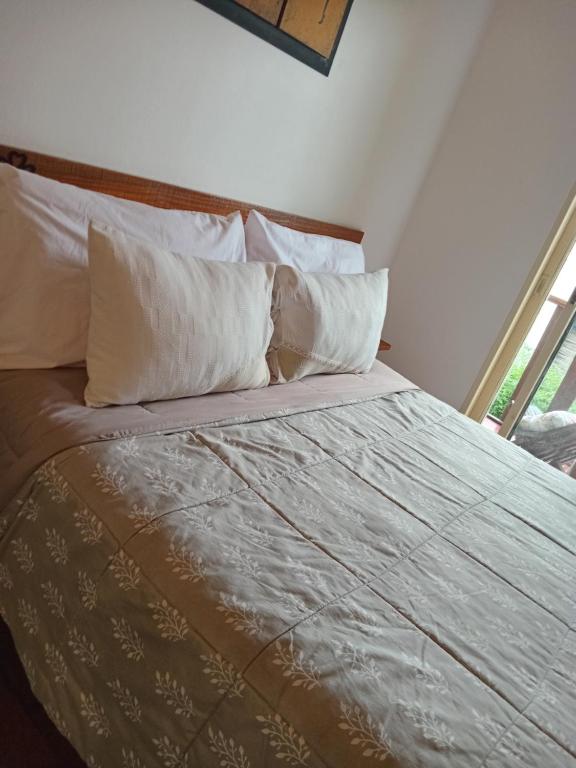Postel nebo postele na pokoji v ubytování El Piul