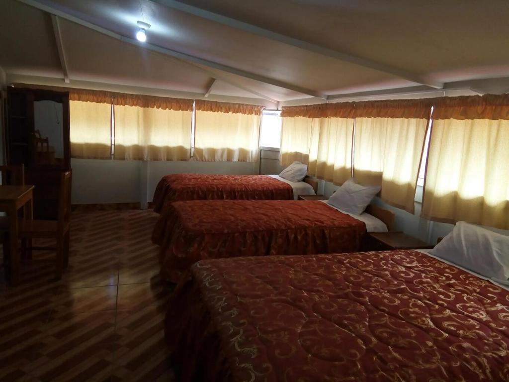 Postel nebo postele na pokoji v ubytování Nafis Casona Apu Linli Pisac